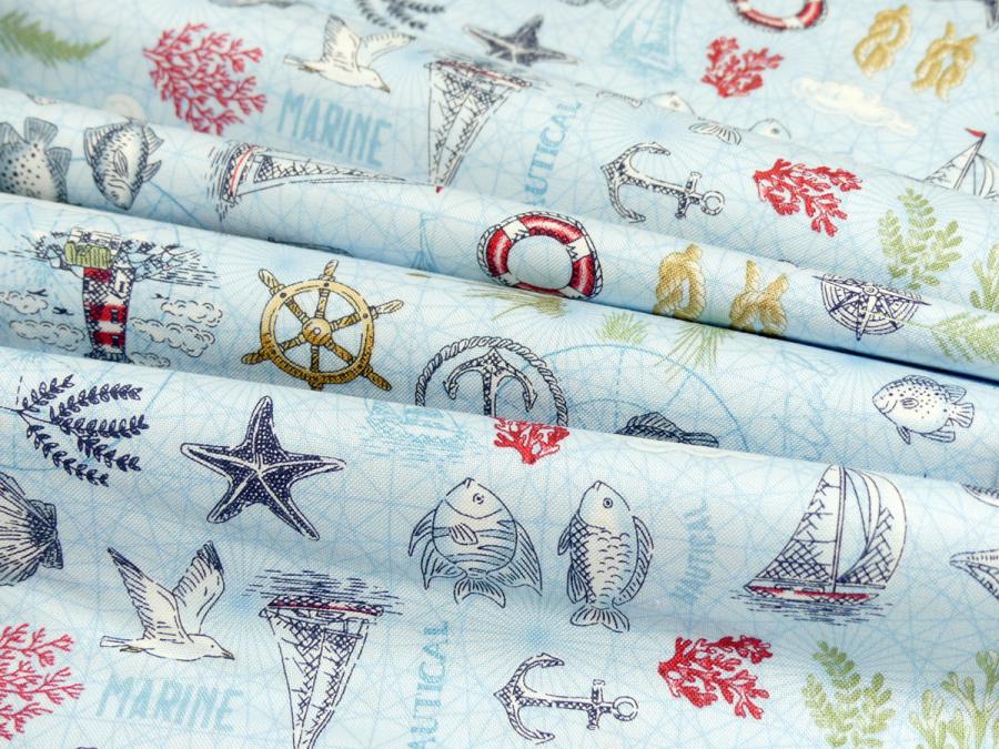 Quiltstoff mit martimen Mustern wie Anker Muschel Seestern aus der Kollektion High Tide von Makower
